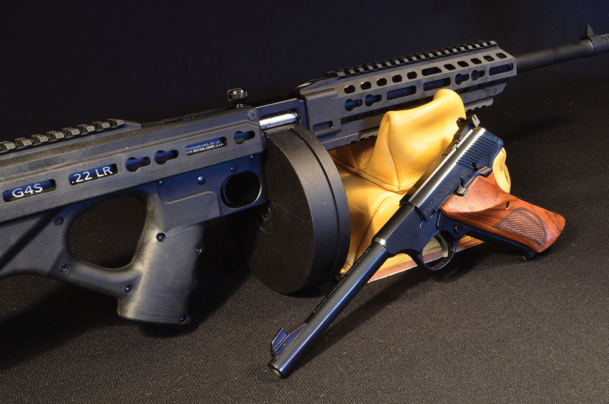 Standard Manufacturing’s Woodsman clone, the SG22, beside another Standard product, the G4S, with a 50-round drum magazine. Something for (almost) everyone.